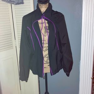 Reebok size large black and purple wind jacket